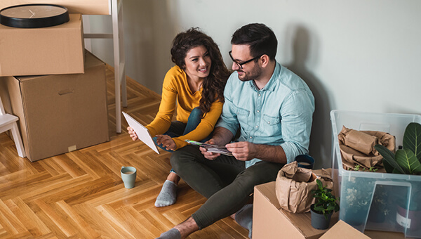 Couple viewing a laptop