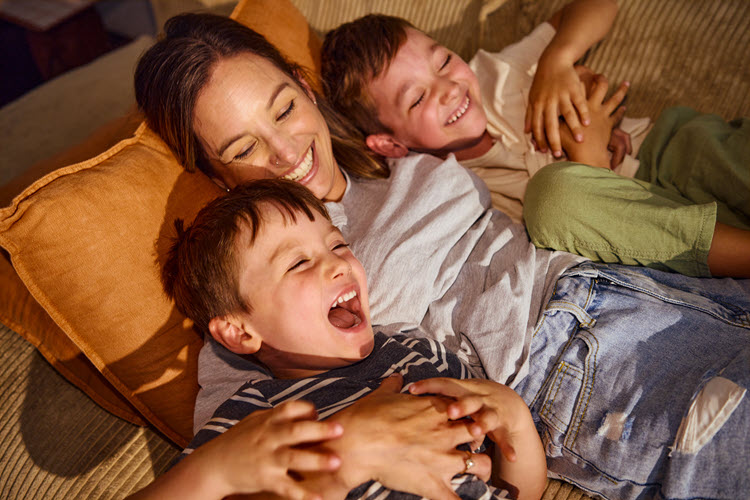 A mother with two toddlers.